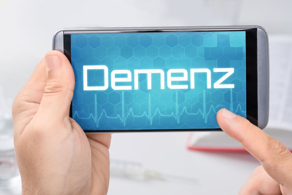 Expertenstandard Demenz Smartphone mit dem Text Demenz auf dem Display