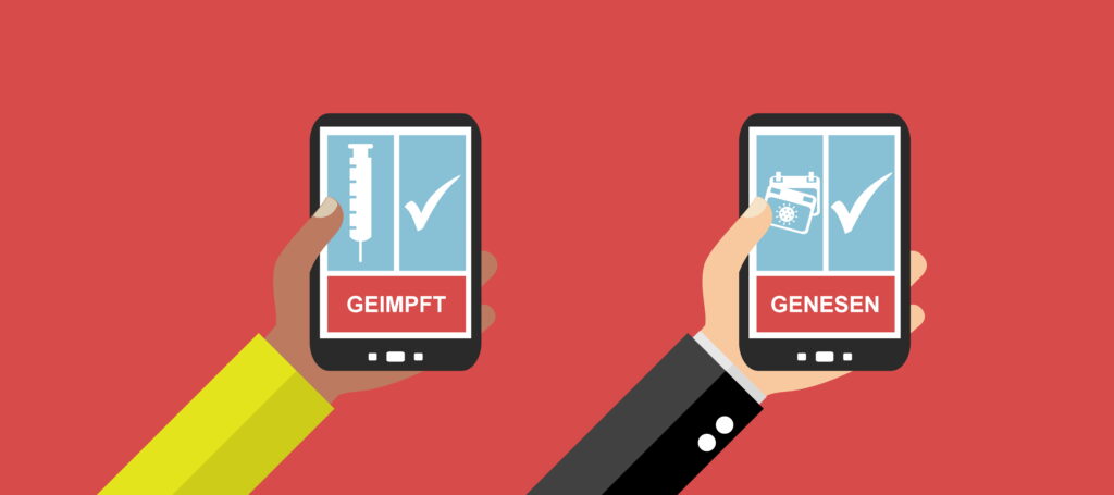 2 Personen zeigen Impfstatus auf dem Smartphone: geimpft und genesen